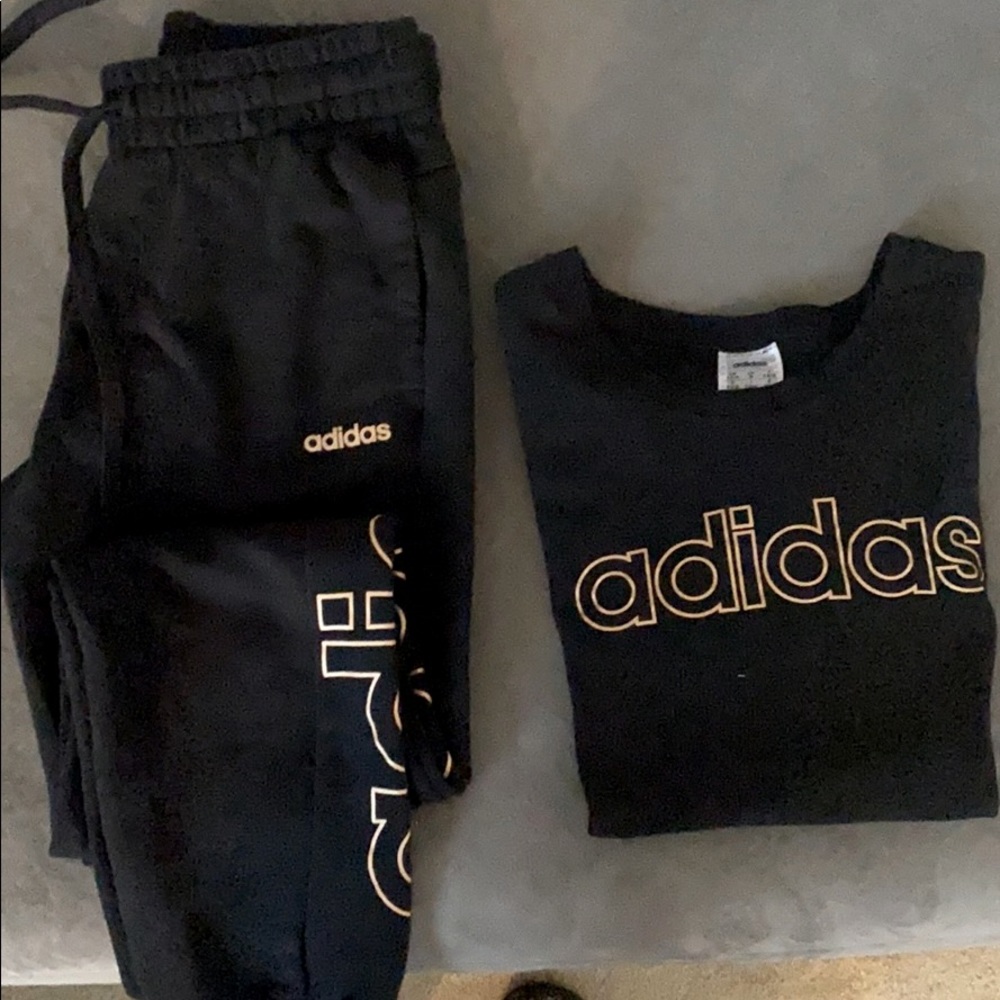 Woman’s adidas sweatpant and T-shirt